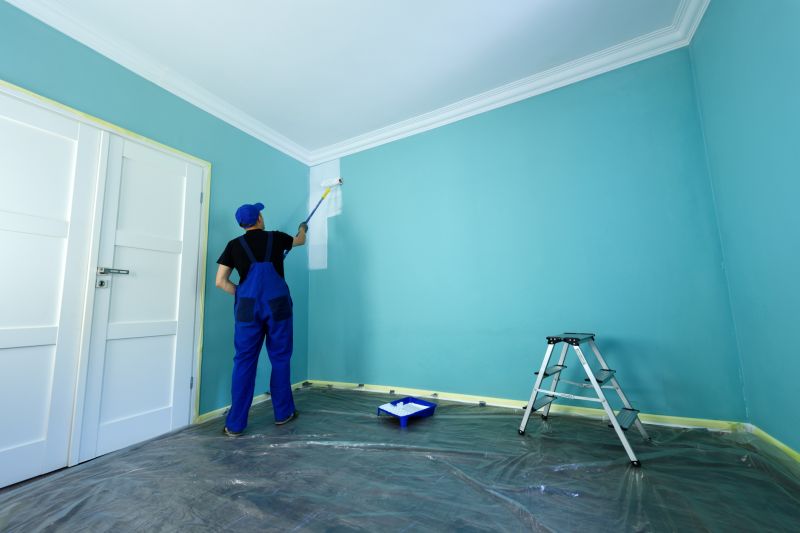 Handyman Painting a Room